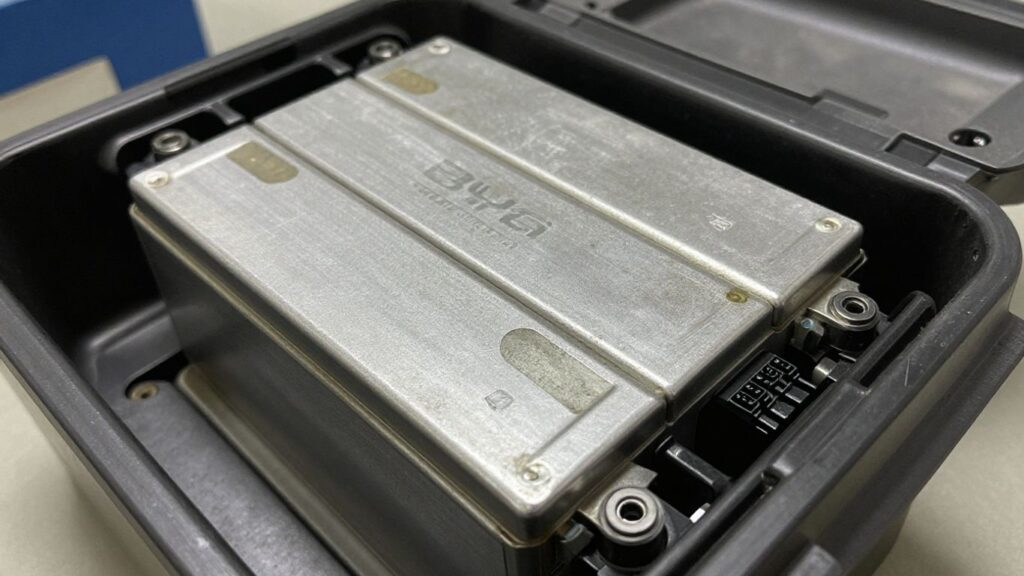 Used BYD electric car battery pack close-up.